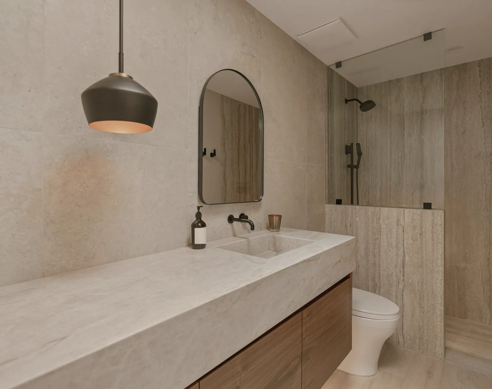 A long vanity beside the shower