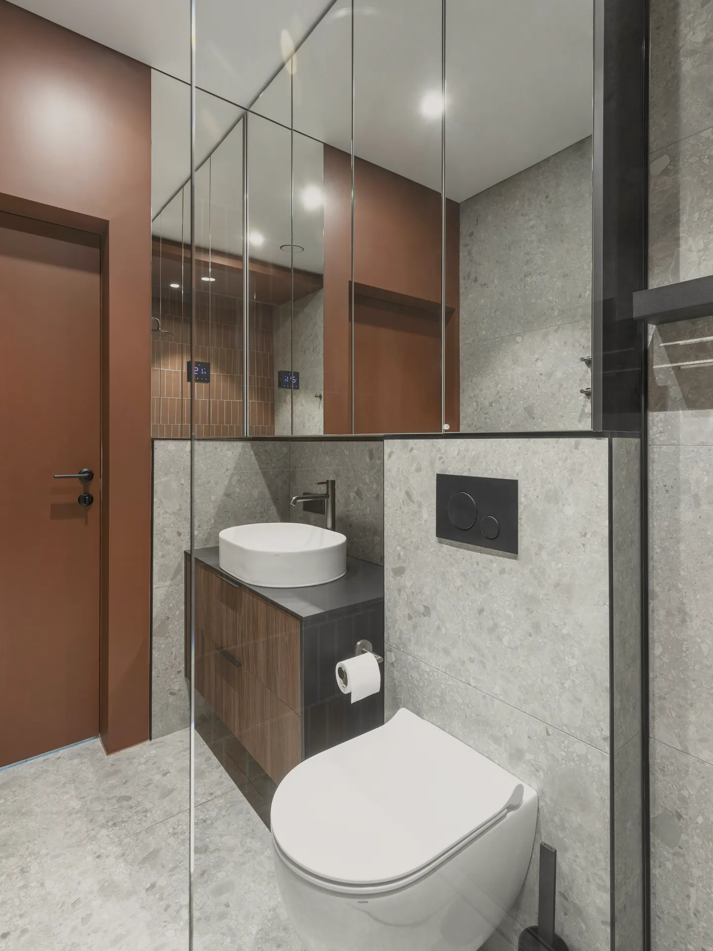 The wall hung pan and a large mirror